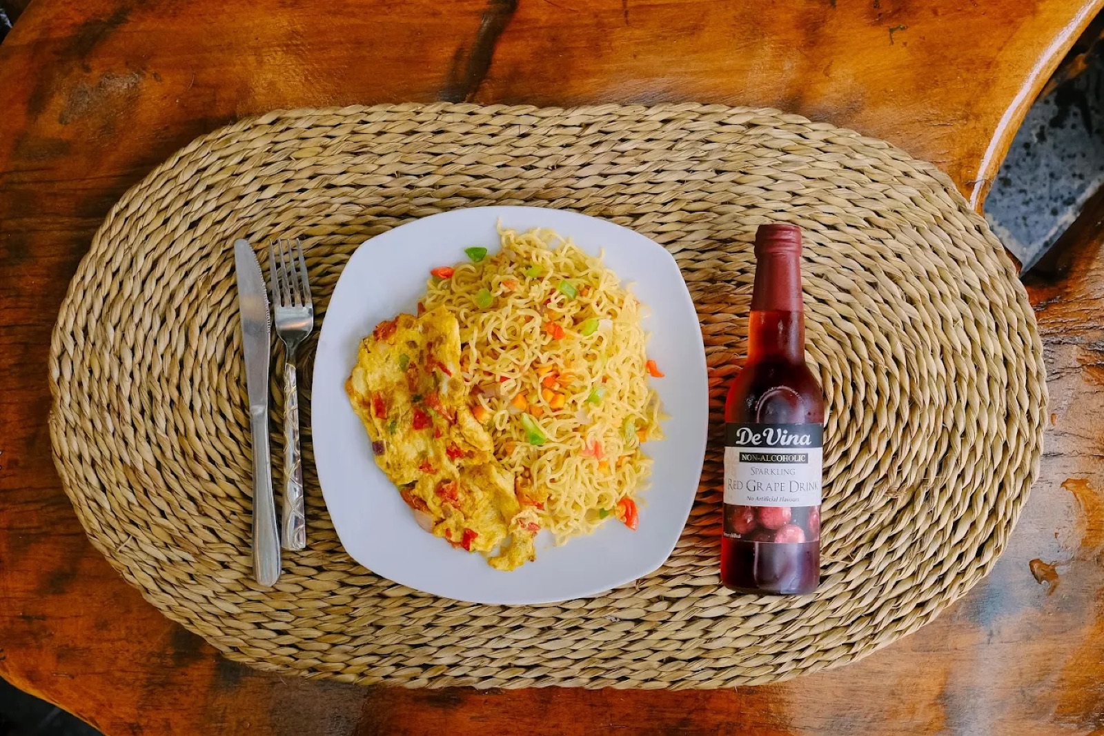 Yard noodles with eggs and a chilled drink